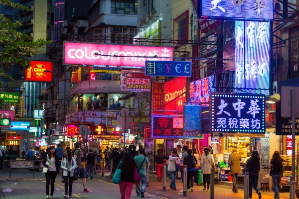 A street with neon signs in Hong Kong